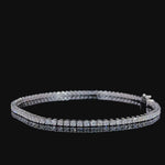 Video of rotating 14K white gold F-G colour, high brilliance, diamond bracelet on black background